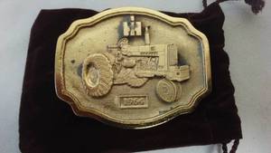 lot 181 image: International Harvester Belt Buckle Tractor 1964 With Bag.