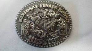 lot 218 image: (2) Hesston National Final Rodeo Belt Buckle.