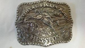 lot 222 image: (2) Hesston National Final Rodeo Belt Buckle.