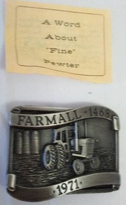 lot 234 image: Farmall 1468 Tractor Belt Buckle. 1971 No. 422