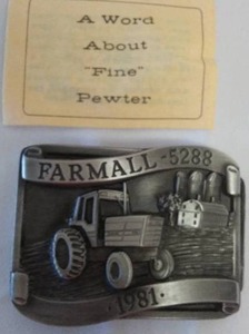 lot 235 image: Farmall 5288 Tractor Belt Buckle 1981 No. 422