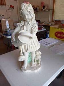 lot 197 image: Girl with watering can outdoor stat...
