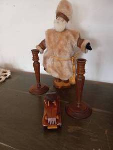 lot 116 image: Brown Outdoor Man on wood stand wit...