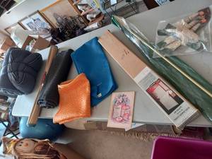 lot 63 image: Sleeping bag, mats, curtain rod & s...