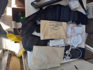 lot 66 image: (2) back braces, heating pad, nebul...