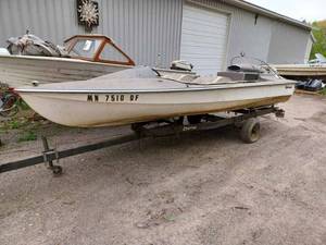 lot 2 image: Mid 1960s 19-foot Hydrodyne Fiberglass Boat with a Merc 120 hp. Inboard (Currently on a Pallet) and Trailer