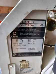 lot 32 image: Onan Ensign 6500 Watt Marine Generator, 126 hours on hobbs, Model No. 6.5MCE A, Serial No. 2940542224