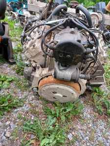 lot 65 image: OMC Model DU-12M Outboard Motor Only - Nothing below the engine and no hood, Serial No. J11218