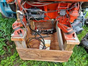 lot 79 image: OMC V SII 245 Inboard Engine and Wood Stand