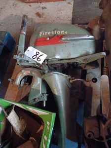 lot 86 image: Vintage Firestone 5 hp. Outboard with Box of Parts, Model No. 133-5-1756, Serial No. 1755 2095
