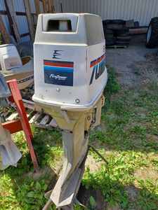 lot 136 image: Evinrude Firepower 70 hp. Outboard - Model No. 70873C, with Stand, Serial No. J0003430