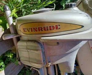 lot 137 image: Vintage Evinrude Outboard with a Brass Prop, Serial No. 0-9831