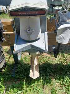 lot 158 image: Homelite Bearcat 4 Cycle - 55 hp. Outboard - Model No. 460A2, Serial No. 1391089