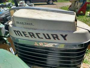 lot 163 image: Vintage Mercury 400 4 cycle 45 hp. Outboard - Missing Lower Unit