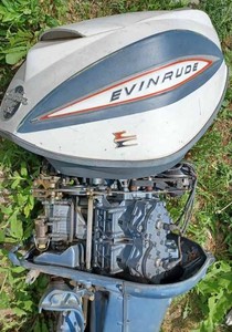 lot 215 image: Evinrude Starflite 6.75 hp. Model No. 75483D Outboard, Serial No. E01655