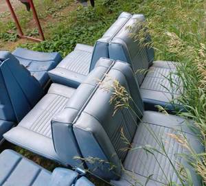 lot 335 image: Two Light Blue Evinrude ForwardRear Facing Seats