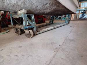 lot 347 image: StorageRepair Boat Dolly on Steel Caster, 11-feet long by 2-feet wide at the front, and 4-feet wide at the rear