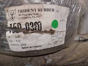 lot 410 image: New Roll of 250-feet of Trident Rubber Clear Hose, 38-inch Inside Diameter, 12-inch Outside Diameter, and a New 25-foot Roll of Tubing