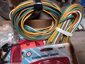 lot 436 image: Box of New Trailer Tail Light and Marker Light Replacement Lenses, 4-Flat Trailer Wires, New License Plate Bracket, and New Nuts, Bolts, and Washers