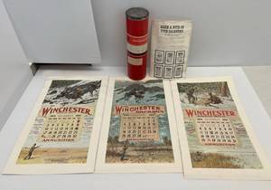 lot 57 image: Set Of Three Winchester Replica Calendar Prints In  Original Winchester Tube