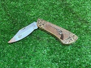 lot 66 image: Franklin Mint Colt Knife