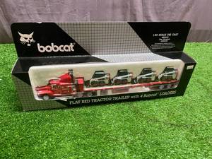 lot 147 image: Bobcat Flat Bed Tractor with 4 Bobcat Loaders 150 Scale