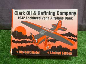 lot 153 image: Clark Oil 1932 Lockheed Vega Airplane Bank