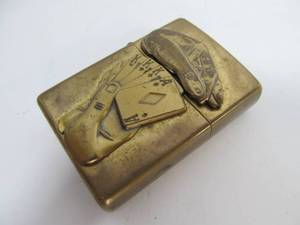 lot 32 image: Vintage Embossed Brass ZIPPO Lighter wPlaying Cards