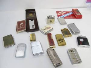 lot 33 image: Nice Group of Vintage Lighters - Including Zippos