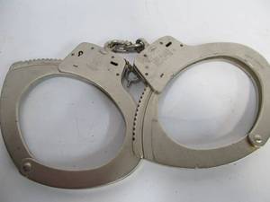 lot 58 image: Old Vintage SMITH & WESSON Handcuffs wKey