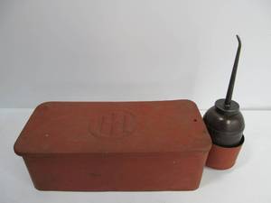 lot 64 image: Vintage Embossed Steel INTERNATIONAL HARVESTER Tractor Tool Box w Our Very Best Oil Can