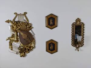 lot 56 image: Four Piece Wall Art Set Mirror Votive Sconce, Music, Gold Tone