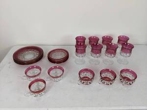 lot 64 image: Collection of 30 Red and Clear Plates and Cups