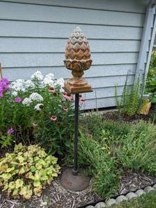 lot 29 image: 2 Piece Garden Decor Pine Cone Figure on an Iron Stand
