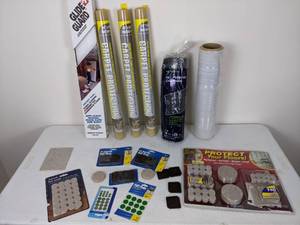 lot 135 image: Assorted Felt Pads, Glide Guard Floor Protector, Carpet Protector Rolls, and Polar Plastics All-Purpose Covering