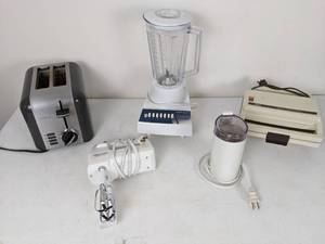 lot 144 image: Hamilton Beach Blender, Oster Belgian Waffle Maker, Household Coffee Mill, Black and Decker Handheld Mixer, Cuisinart 2-Slice Toaster