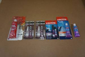 lot 33 image: Shoe Goo, Super Glue and Flexible Adhesive