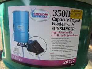 lot 85 image: (New) 55 gal Solar Powered Deer Feeder