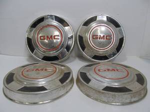 lot 47 image: Set of 4 Vintage GMC Truck Hubcaps