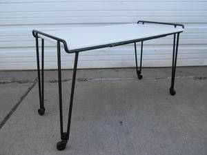 lot 99 image: Mid Century Rolling Hairpin Leg Table