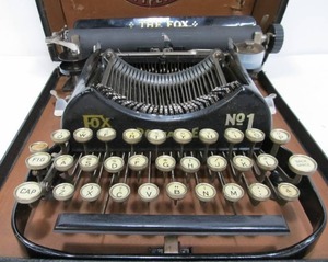 lot 152 image: Very Cool Vintage FOX No. 1 (Baby Fox) Light Running Folding Typewriter