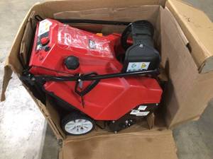 lot 38 image: Troy-Bilt Squall 21 in. 179 cc Single-Stage Gas Snow Blower with Electric Start and E-Z Chute Control Slightly Damaged  Customer Returns See Terms on Auction