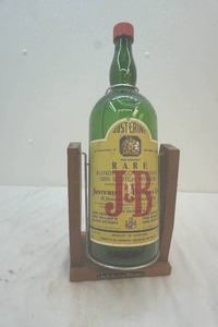 whiskey bottle on stand