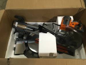 RIDGID 15 Amp Corded 12 in. Dual Bevel Sliding Miter Saw with 70 Deg. Miter Capacity and LED Cut Line Indicator Customer Returns See Terms on Auction