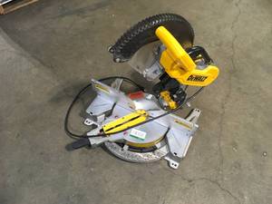 DEWALT 15 Amp Corded 12 in. Double-Bevel Compound Miter Saw with Cutline LED Customer Returns See Terms on Auction