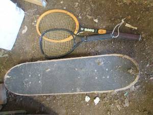 Skateboard, tennis racquet and racq...