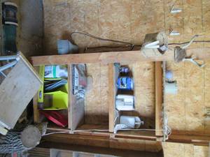 Contents of shelf and small deer an...
