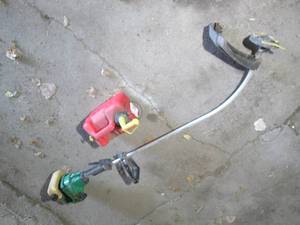 Featherlite weed eater and 1gal gas...