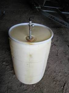 50 gallon drum with spigot and shut...