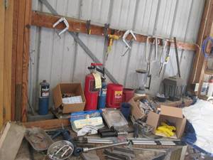 Contents of work bench and wall inc...